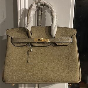 Wiirkin Tan Leather Satchel with Gold Hardware. Dust bag included